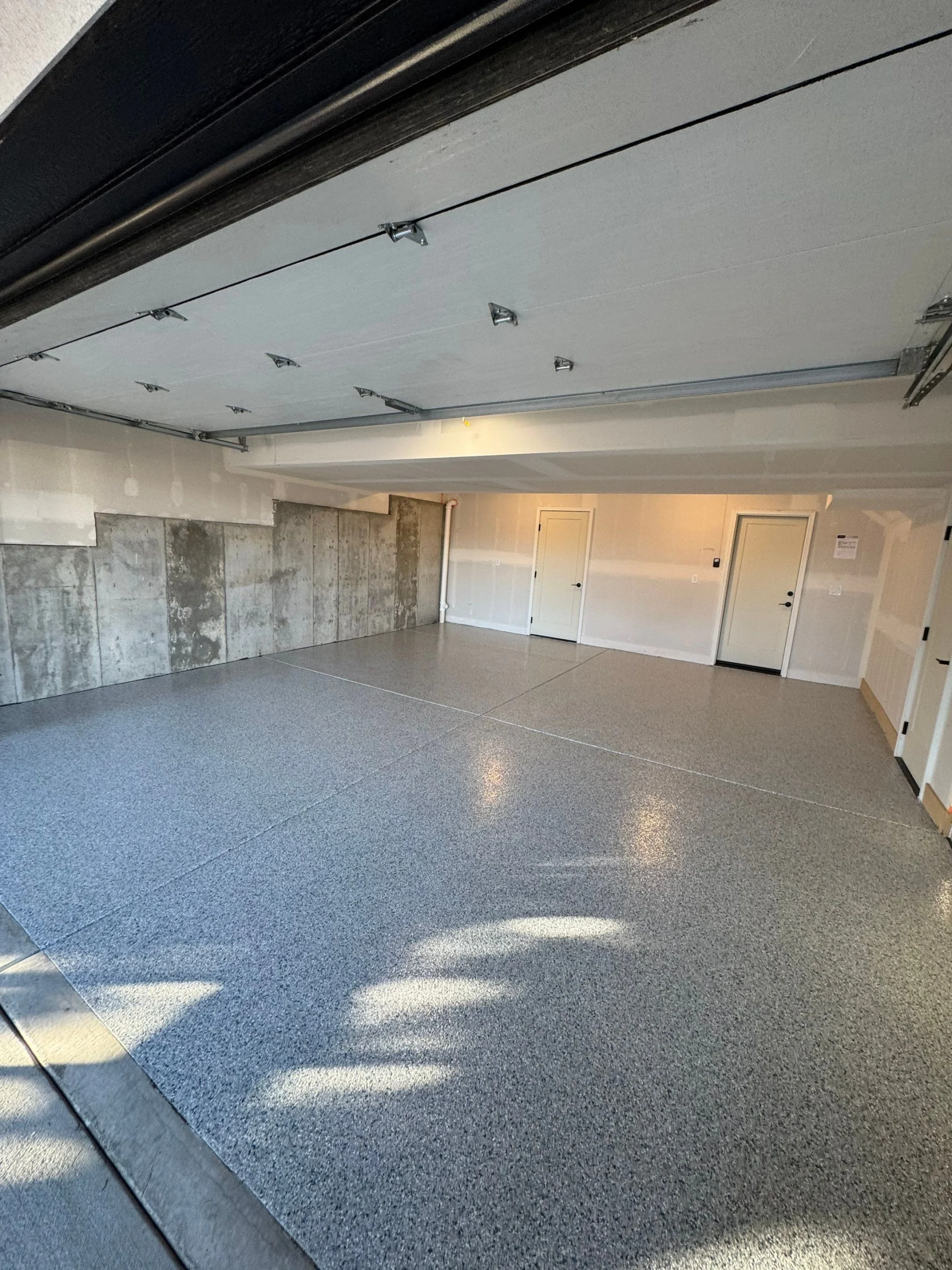 Centennial Garage Floor Coating: Polyaspartic, Stain-Resistant & Easy Clean