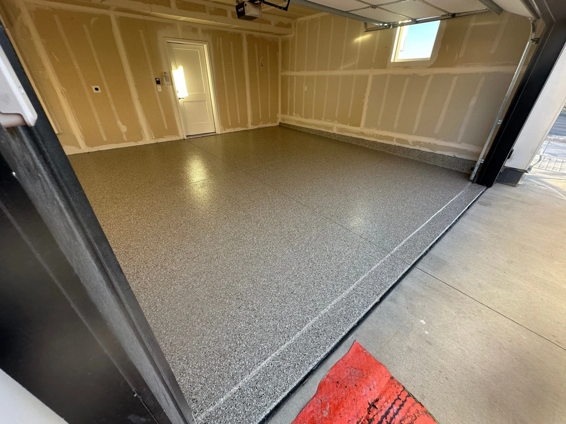 Denver New Build Garage Floor: Creekbed Flake in 1 Day