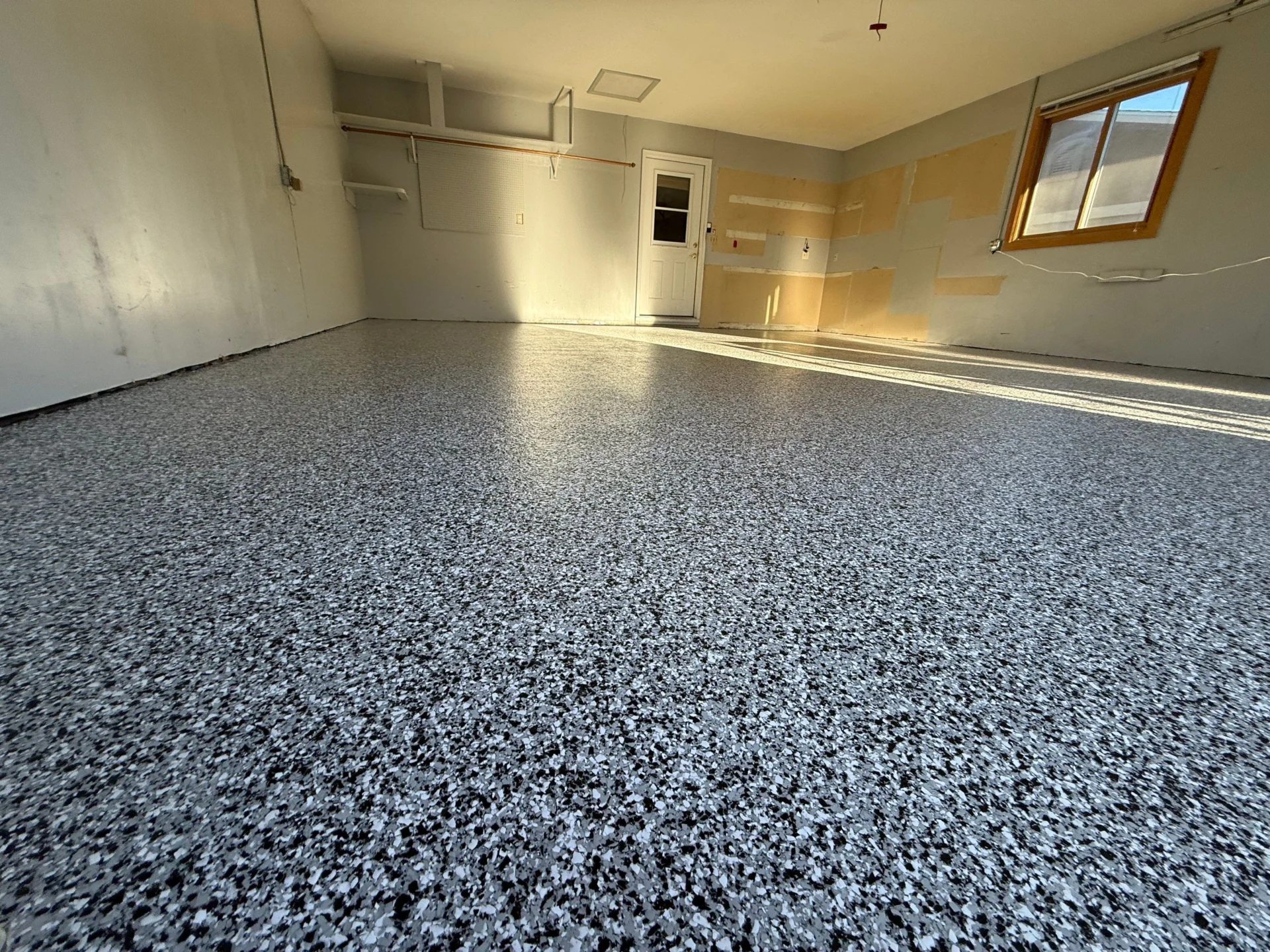 Colorado Springs Garage Transformed: Polyaspartic Coating & Repair