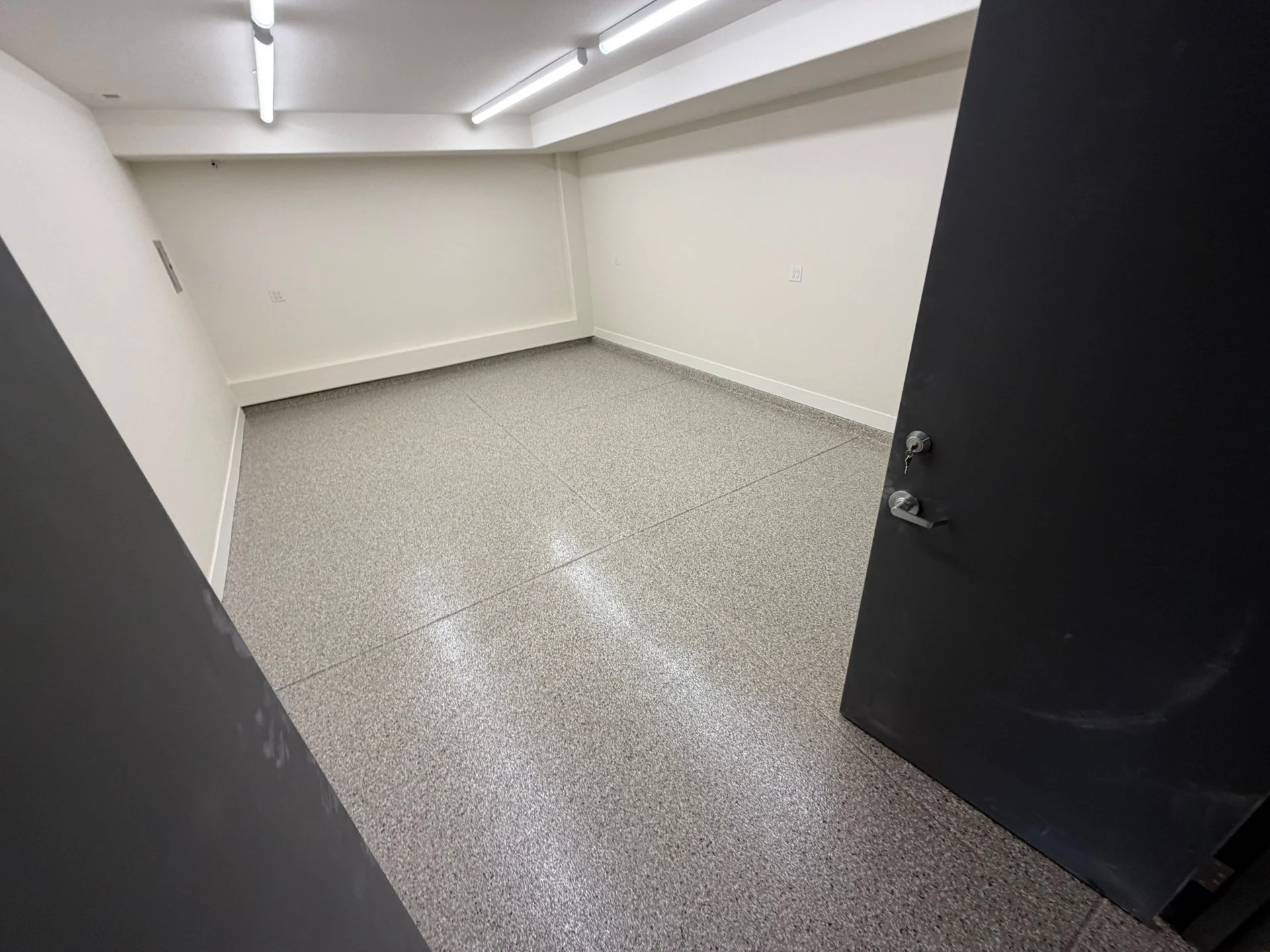 Parker Shop: Polyaspartic Coating & Cove by Solid Custom Floor
