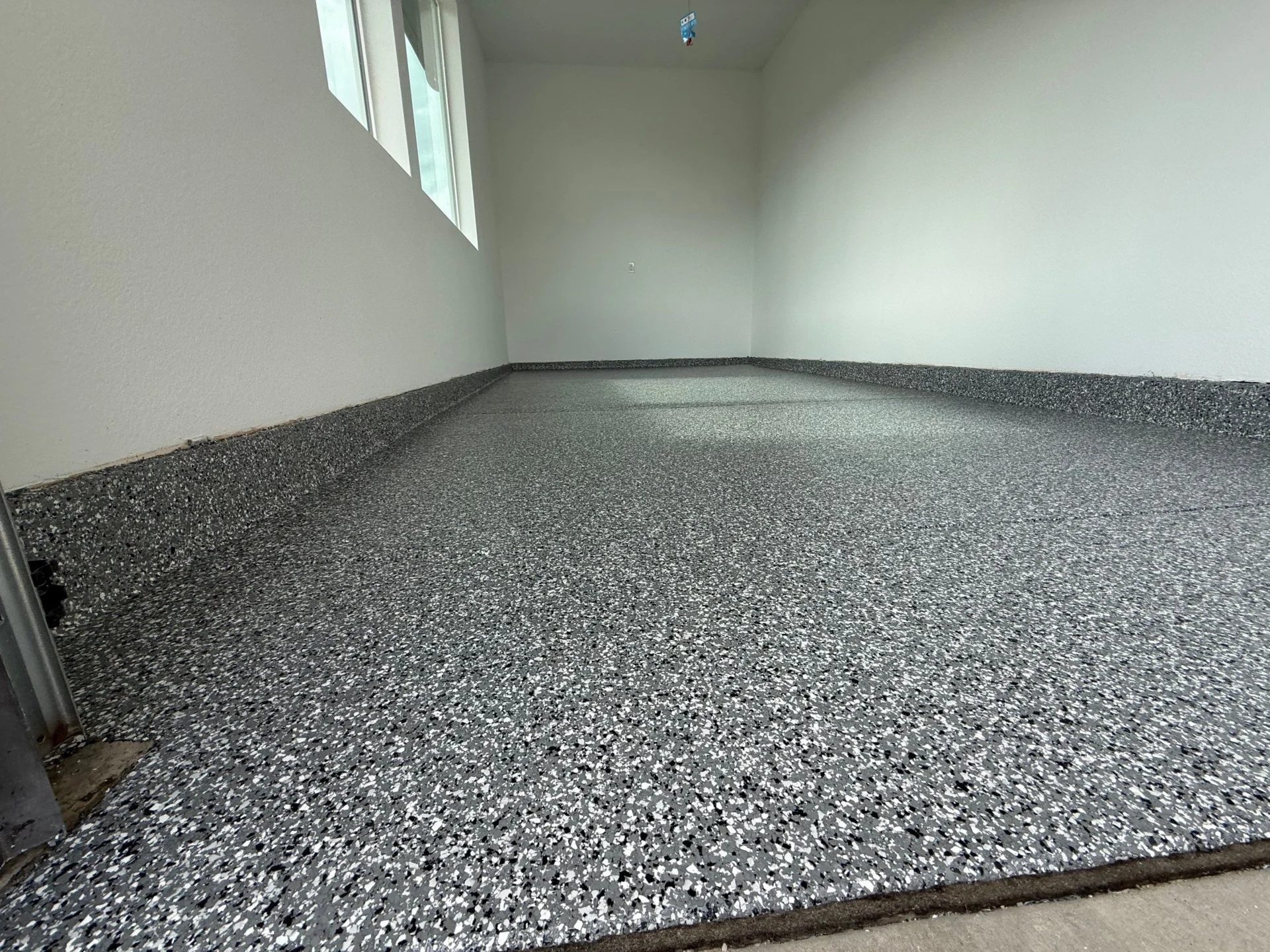 Wombat Flake Polyaspartic Garage Floor Littleton